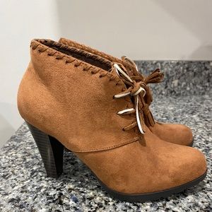 Brown heel booties.